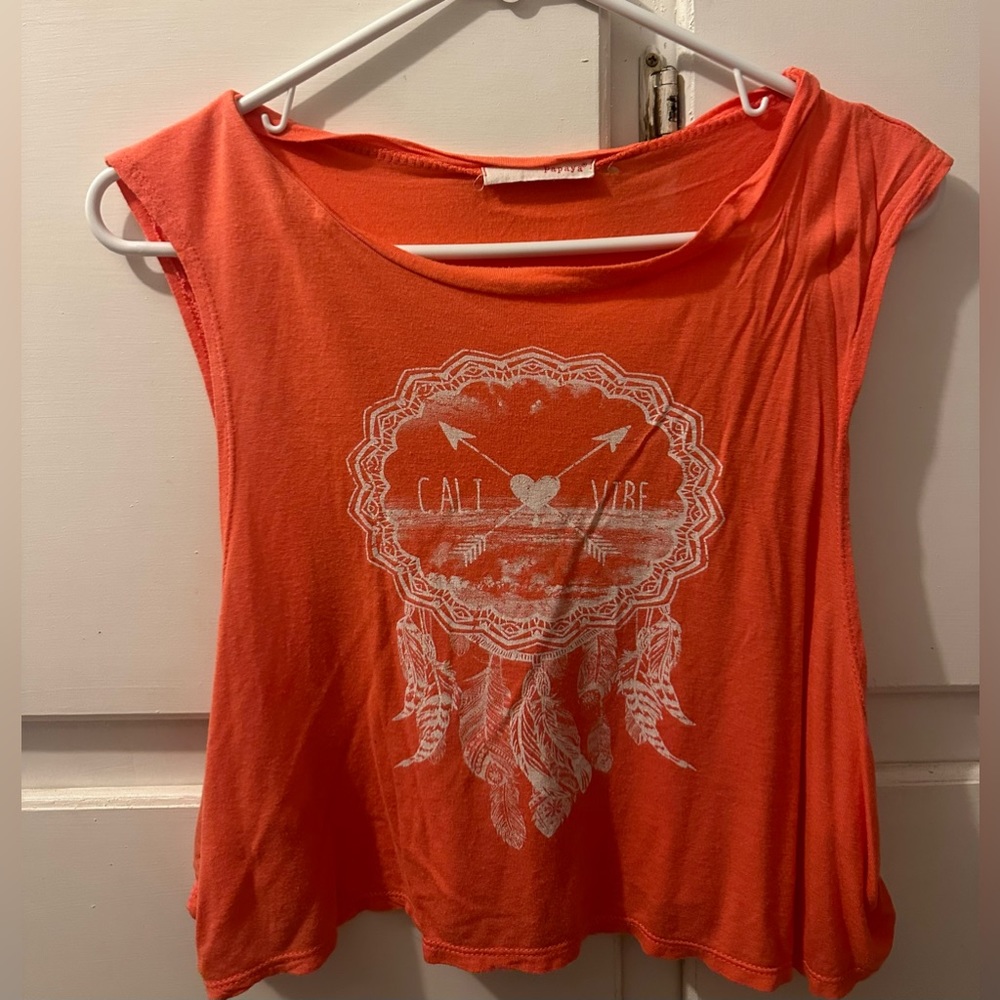 Papaya Woman’s cropped tank top. Orange Size medium.